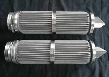There are two pleated candle filters fabricated from sintered steel wire mesh.