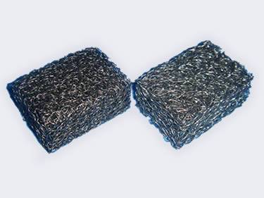 Two rectangular compressed knitted mesh filters.